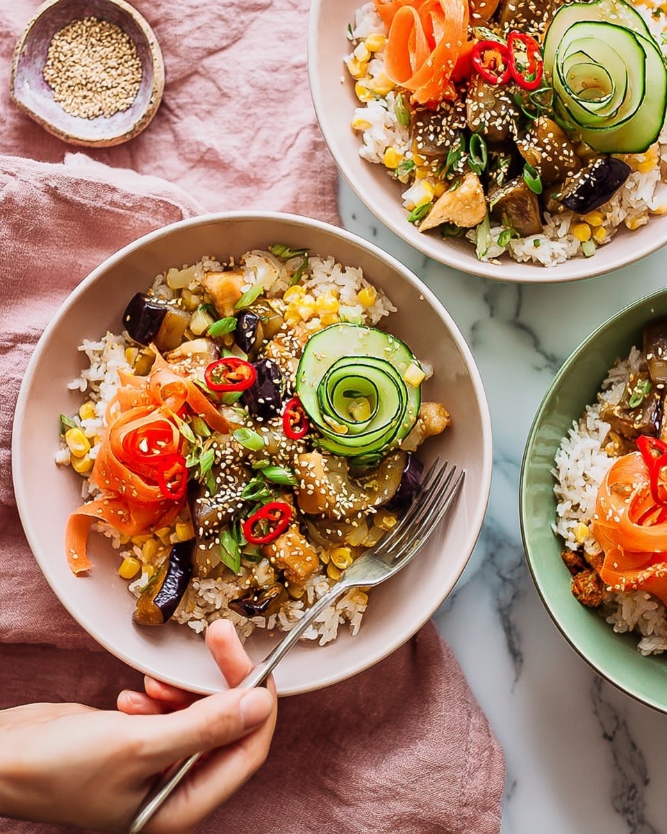 Two white bowls are filled with a colorful rice dish arranged in about four layers. The bottom layer is white rice mixed with small pieces of corn, visible in soft yellow. On top of the rice, there are chunks of roasted eggplant and small pieces of chicken scattered around, both showing a mix of brown and golden tones. The next layer has thin, curled ribbons of orange carrot and several thin, folded green cucumber slices placed on top in a decorative way. The dish is garnished with bright red chili slices, green sliced scallions, and sesame seeds sprinkled over everything. A woman's hand is holding a fork in the left bowl, ready to eat. The bowls rest on a white marbled surface covered partly by a faded pink and a light green cloth. Photo taken with an iphone --ar 4:5 --v 7