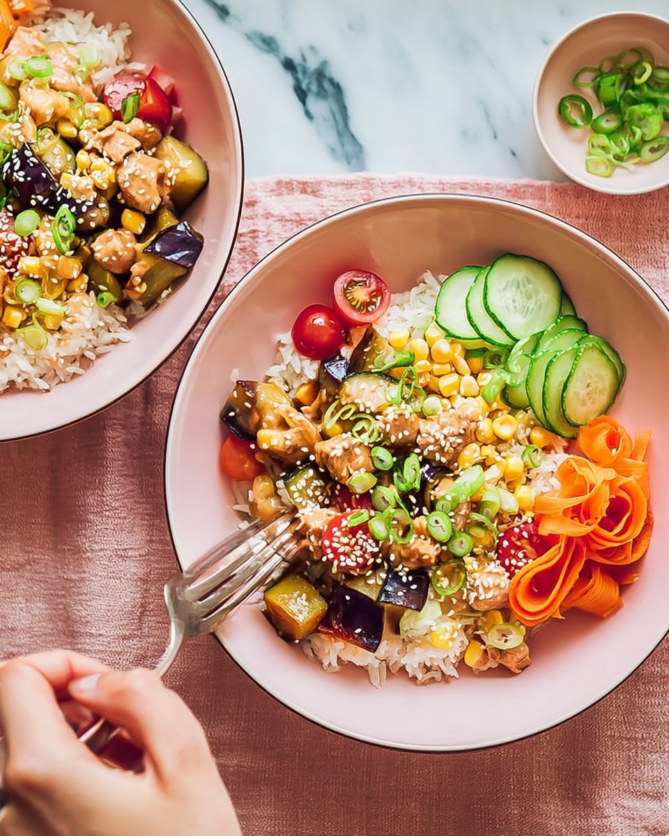 The image shows two pink bowls filled with a colorful rice dish placed on a white marbled surface with a pink cloth underneath. Each bowl contains a base layer of white rice mixed with yellow corn kernels, topped with pieces of brown eggplant and small chunks of light brown cooked chicken. The next layers include thin green cucumber ribbons, bright orange carrot curls, and halved red cherry tomatoes. The dish is garnished with sliced green onions and white sesame seeds, adding texture and color contrast. A woman's hand is holding a fork in the closest bowl, ready to take a bite. photo taken with an iphone --ar 4:5 --v 7