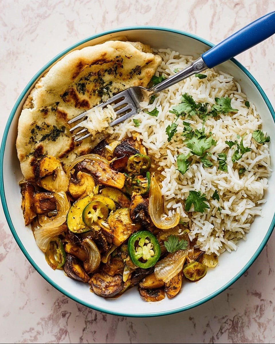 A white bowl sits on a white marbled surface, filled with three main layers: on the left side is a piece of golden brown flatbread with green herb bits scattered on top and torn edges, on the top half is a pile of fluffy white rice with separated grains, and on the right side is a mix of sautéed orange and brown mushrooms, sliced yellow onions, and green jalapeño rings, garnished with bright green cilantro leaves. A fork with a dark blue handle rests on the left edge of the bowl, partly on the flatbread. photo taken with an iphone --ar 4:5 --v 7
