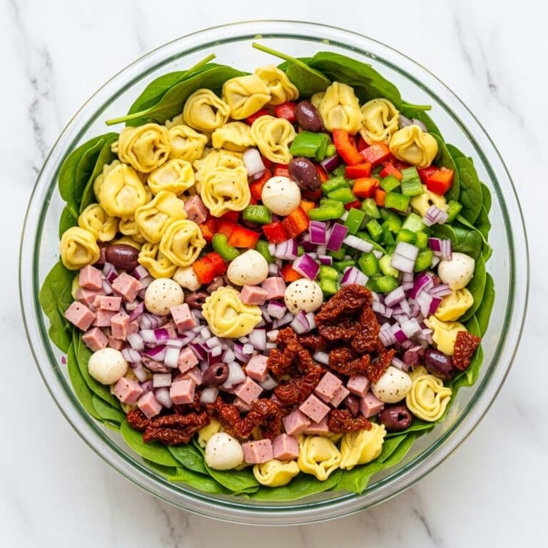 Tortellini Pasta Salad with Sun-Dried Tomatoes, Mozzarella, and Balsamic Honey Vinaigrette Recipe